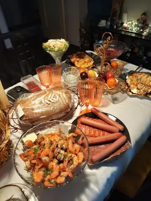 a table with a bunch of food on it at Coazmatic apartment in Kerak