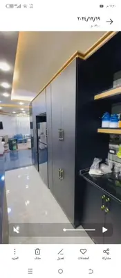 a kitchen with two lockers in a room at Mona villa in Irbid