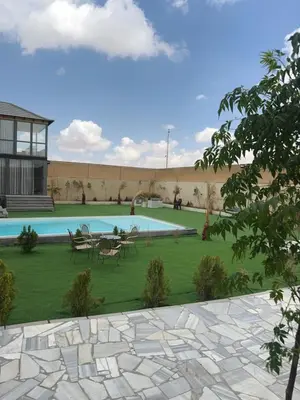 a rendering of a courtyard with a swimming pool at the royal occasion amman in Amman