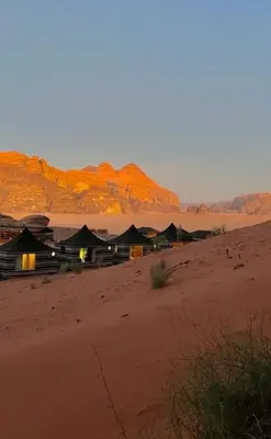 a group of huts in the middle of the desert at RUM MARS BUBBLE lUXURY CAMP in Wadi Rum