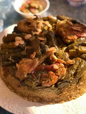 a pile of food on a white plate at WaterMill House in Wadi Musa