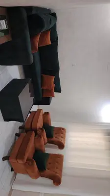 a group of brown socks hanging from a ceiling at Al Wesam Furnished Apartments in Aqaba
