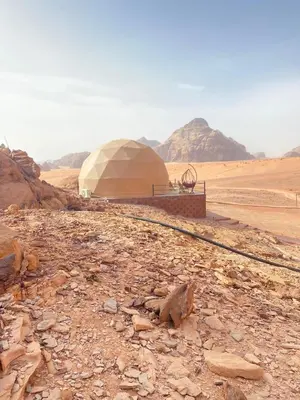 a large tent in the middle of a desert at Green Desert in Wadi Rum