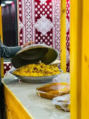 a table with two bowls of food on top of it at Wadi Rum party luxury camp in Disah