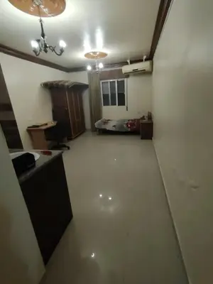 a large room with a room with a bed in it at غرفة مفروشة in Irbid