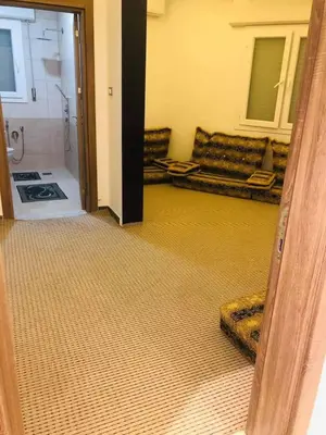 an open door to a room with a bathroom at almiddle house in Kafr Asad