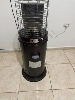 a black blender sitting on a tile floor at Bonuk House in Kufayrāt Abū Khīnan
