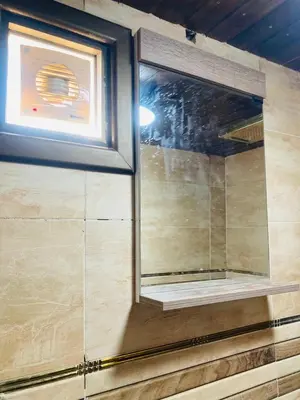 a window in the corner of a room at Bedouin House in Jurf ad Darāwīsh