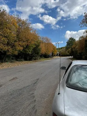 a car parked on the side of a road at الاردن in Jurf ad Darāwīsh