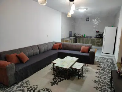 a living room with a couch and a table at شقق ابو يزن عجلون بالقرب من محمية عجلون in Ajloun