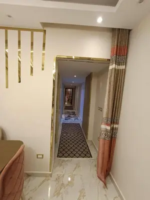 a hallway leading into a room with a hallwayngthngthngthngthngthngthngth at البويضه هاوس in Al Buwayḑah