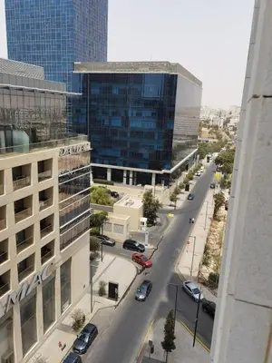 a view of a street in a city with buildings at Boulevard luxury Studio in Amman