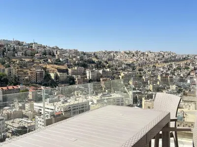 a view of a city from the roof of a building at Brand new, Modern, Breathtaking view, just for you in Amman