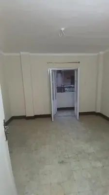 an empty room with a room with a door and a room with a room at الجبل الاخضر هاوس in Al ‘Ālūk
