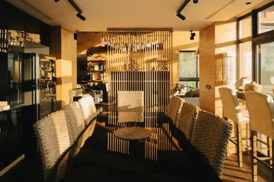 a dining room with chairs and a table at Al Bader Resort in Jurf ad Darāwīsh