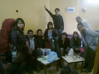 a group of people sitting in a living room at man -soor in Amman