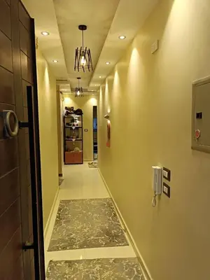 a hallway with a hallwayngthngthngthngthngthngthngthngthngthngthngth at بليله هاوس in Balīlā