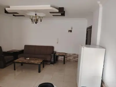 a living room with a couch and a table at الخليل 3 in Irbid
