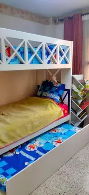 a white bunk bed in a room at الضليل هاوس in Abū Ghārah