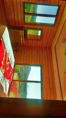 an overhead view of a room with a window at Mountain Oak Chalet شالية ملول الجبل in Al Jafr