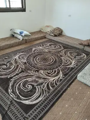 a rug with a design on it in a room at ام الينابيع عجلون in Ajloun