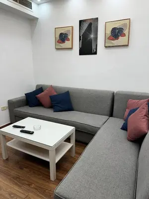 a living room with a couch and a coffee table at استوديو الرابية 19 studio alrabyeh in Al Jafr