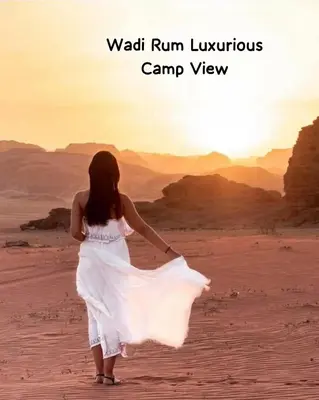a woman in a white dress walking in the desert at Wadi Rum Luxurious Camp View in Wadi Rum