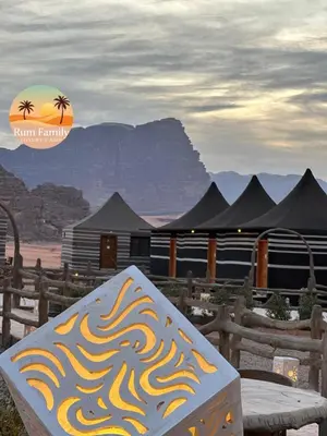 a painting on a bench in front of a building at RUM fAMILY lUXURY CAMP in Wadi Rum