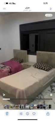 a picture of a bed in a room at مزرعة وفيلا غابة الارز in Jerash