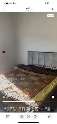 a screenshot of a bed in a room at فيلا مفروشه ومزرعه للايجار in Jerash