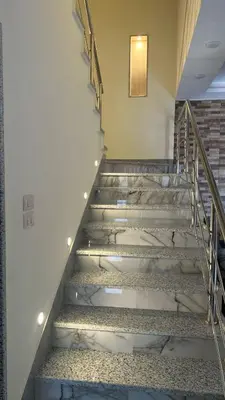 a set of stairs in a building at شاليهات إيليت بانوراما فيو in Jerash