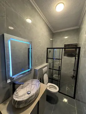 a bathroom with a sink and a toilet at stay by university of Jordan in Amman