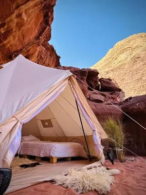 a tent is set up in the desert at The Legacy of Wadi Rum in Wadi Rum