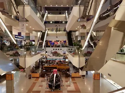 a view of a shopping mall from the second floor at Cozy and well-located 2 bedroom flat near a mall in Amman