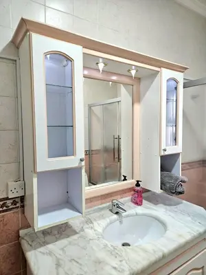 a bathroom with a sink and a mirror at Red Sea Pearl Luxury Villa in Aqaba in Aqaba
