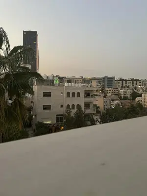 a view of a city from the roof of a building at EVANNA SUITE & HOTELs VIP ايفانا للشقق الفندقيه VIP in Amman