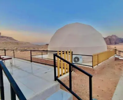 a dome observatory in the middle of the desert at LUXURY camp in Disah
