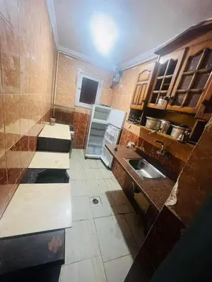 a kitchen with a sink and a counter top at Sky apartment in Amman