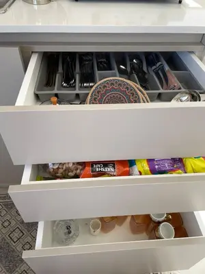 a drawer filled with lots of food and drinks at For Rent ,New Furnished Rooftop in Shafa Badran in Amman