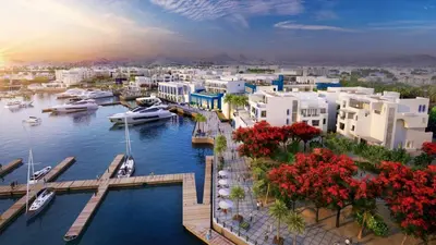 a view of a harbor with boats in the water at Ayla Oasis Golf Apartment - Ayla Vista in Aqaba