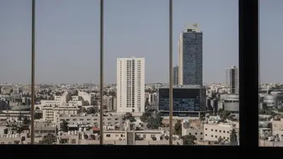 a view of a city from a window at Sandy Palace Hotel Amman in Amman