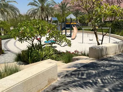 a playground with a slide in a park at قرية الراحة مرسى زايد باطلالات خلابة alraha village with Beautiful view in Aqaba