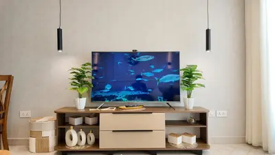 a living room with a large fish tank at واحة ايلة ازور in Aqaba