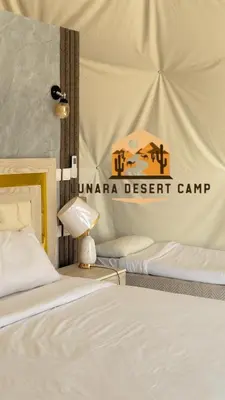 a room with two beds and a tent at Lunara Desert Luxury Camp in Wadi Rum