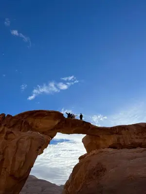 two people standing on a bridge in the desert at NOVA lUXURY CAMP in Wadi Rum