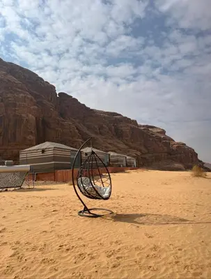 a metal object in the middle of the desert at Noor Luxury Camp Wadi Rum in Wadi Rum