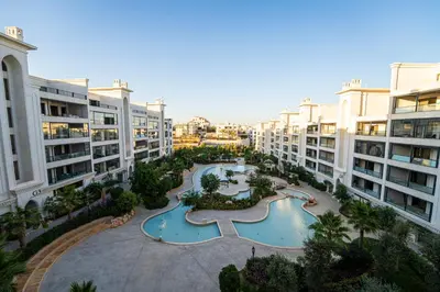 an aerial view of a courtyard in a apartment building at كمباوند شقة مفروشة كومباوند الامعري المطار 222 in Amman