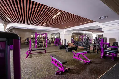 a gym with purple gym equipment in a building at كمباوند شقة مفروشة كومباوند الامعري المطار 222 in Amman