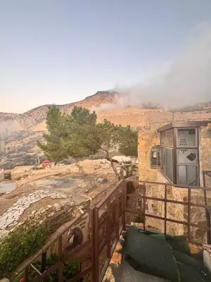 a view of a mountain from a balcony of a house at TOWER Hotel in Dana