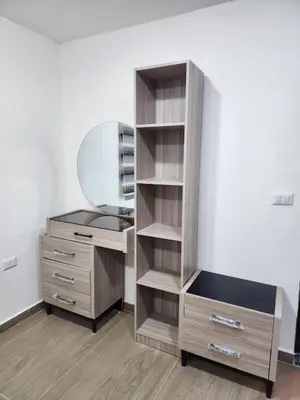 a dressing room with a mirror and a desk at شقة مفروشة apartment amman alnuzzha in Amman